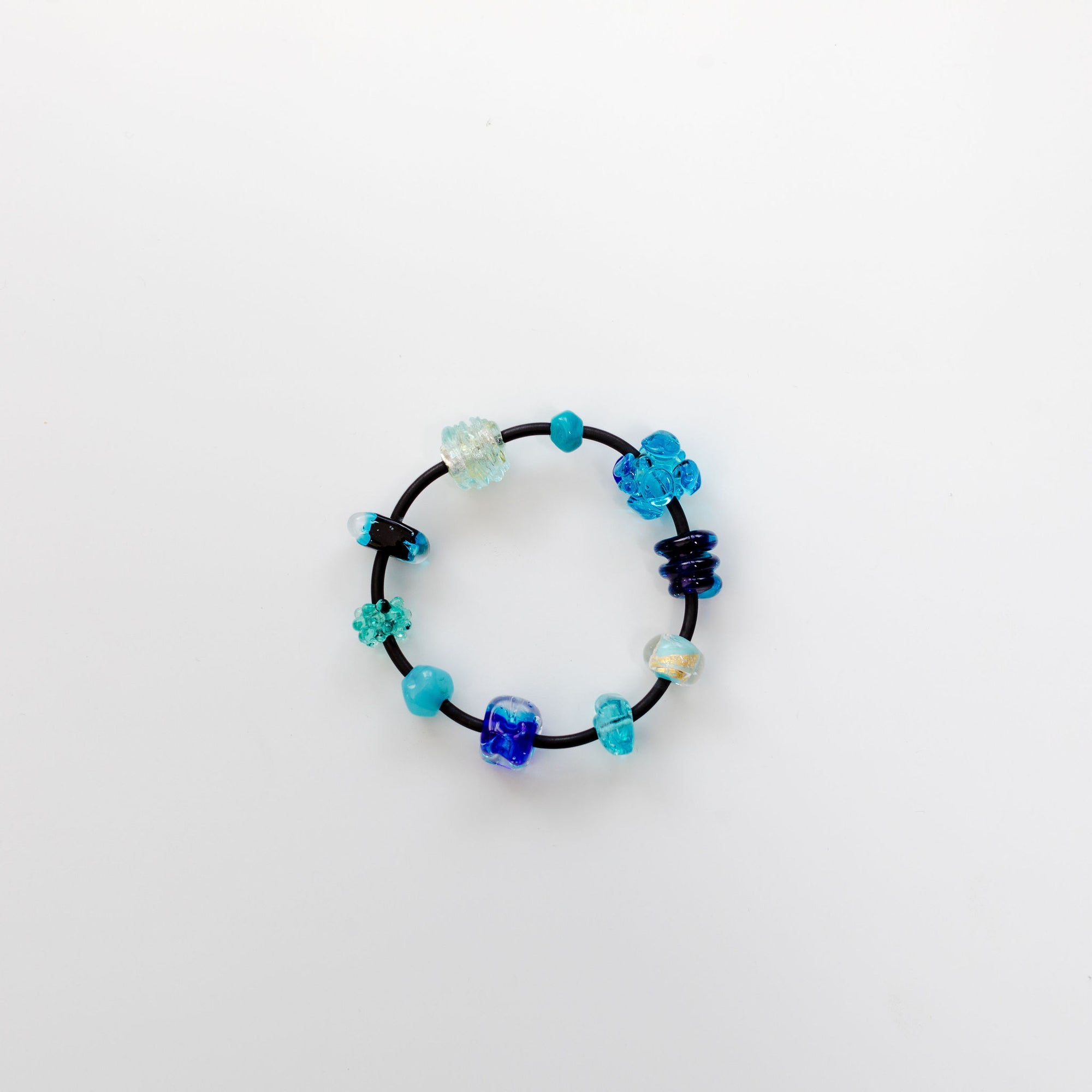 11 Glass Beads on Neoprene Bracelet