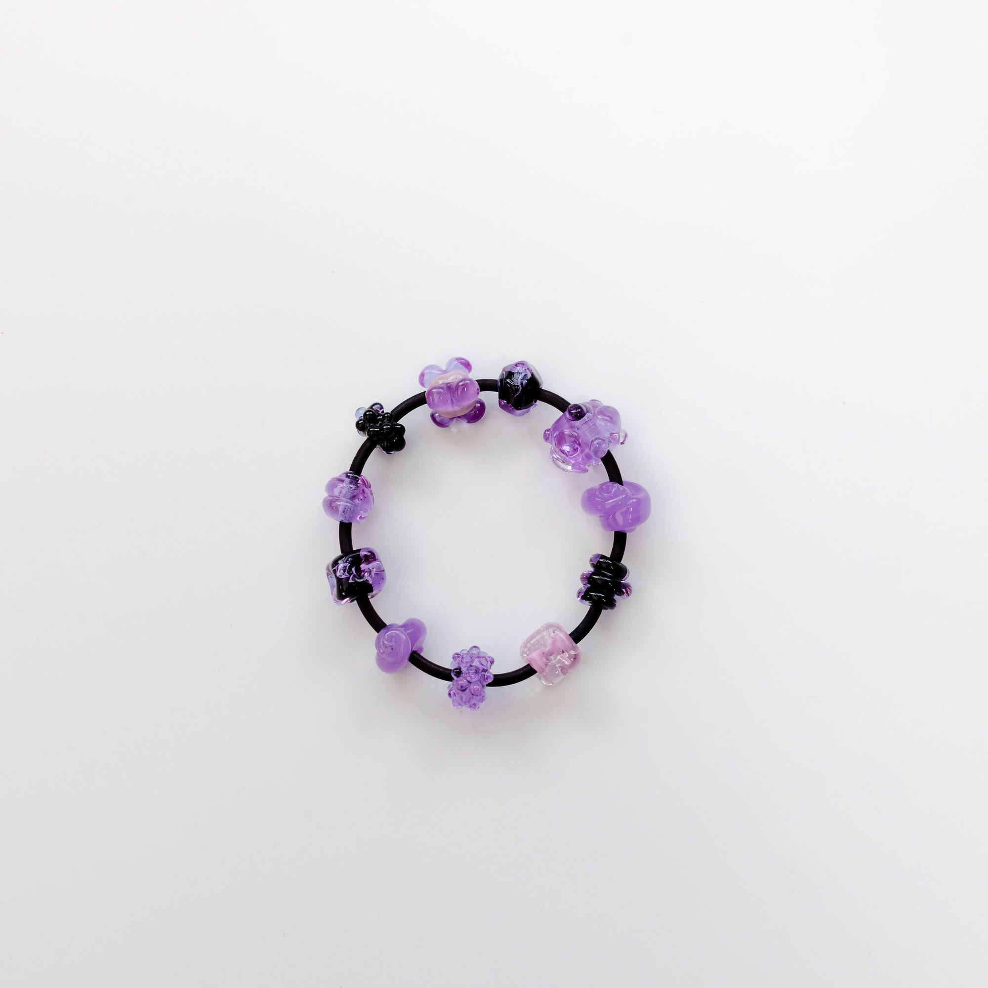 11 Glass Beads on Neoprene Bracelet